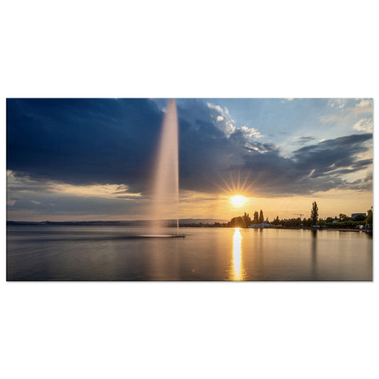 Canvas water fountain on Lake Zug at sunset