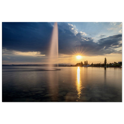 Canvas water fountain on Lake Zug at sunset