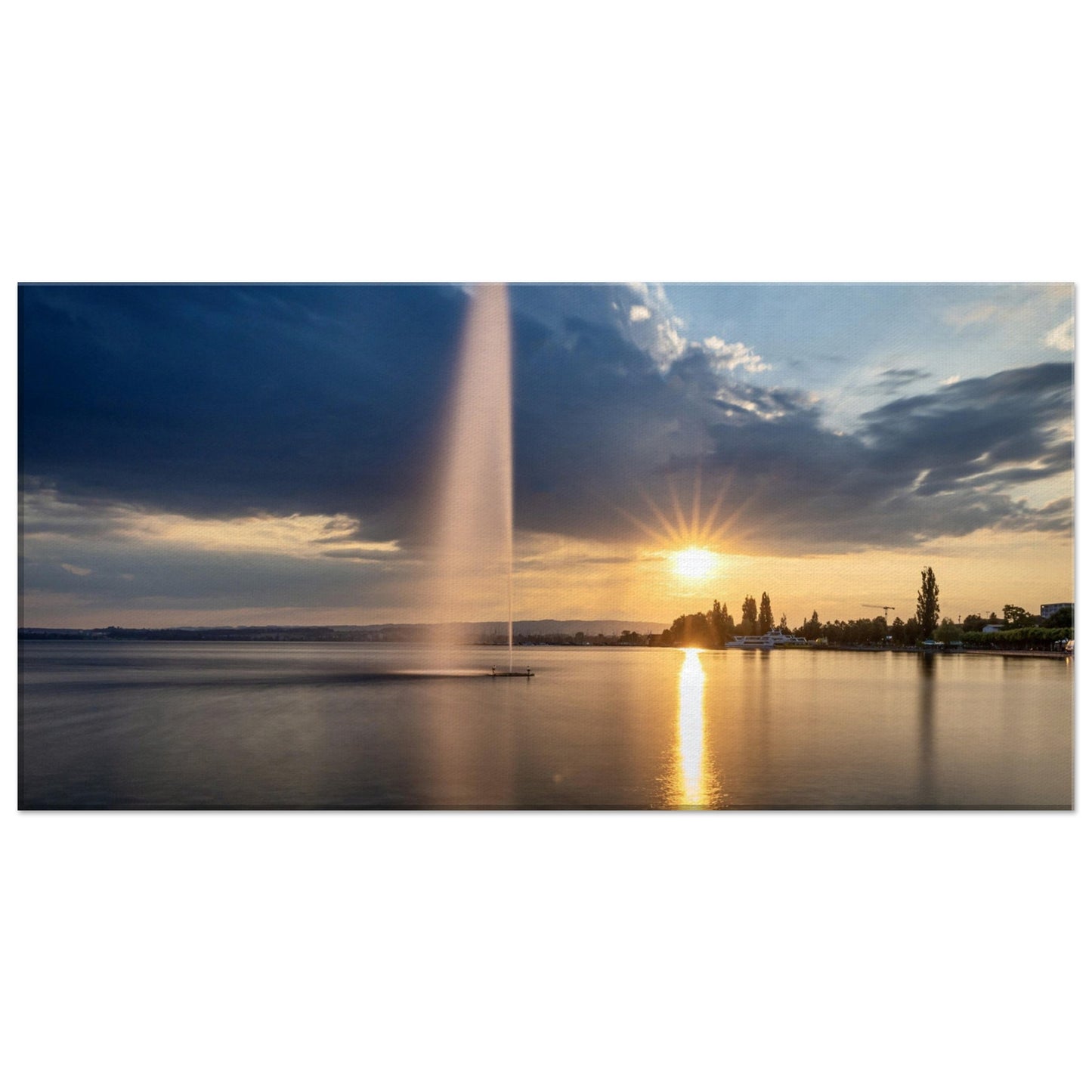 Canvas water fountain on Lake Zug at sunset