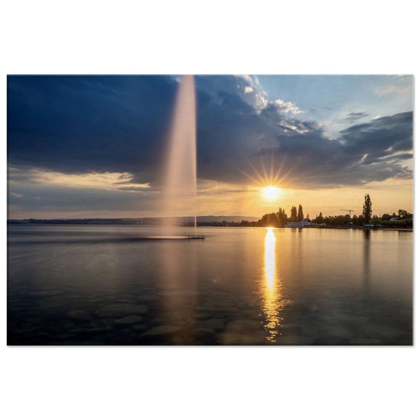 Canvas water fountain on Lake Zug at sunset